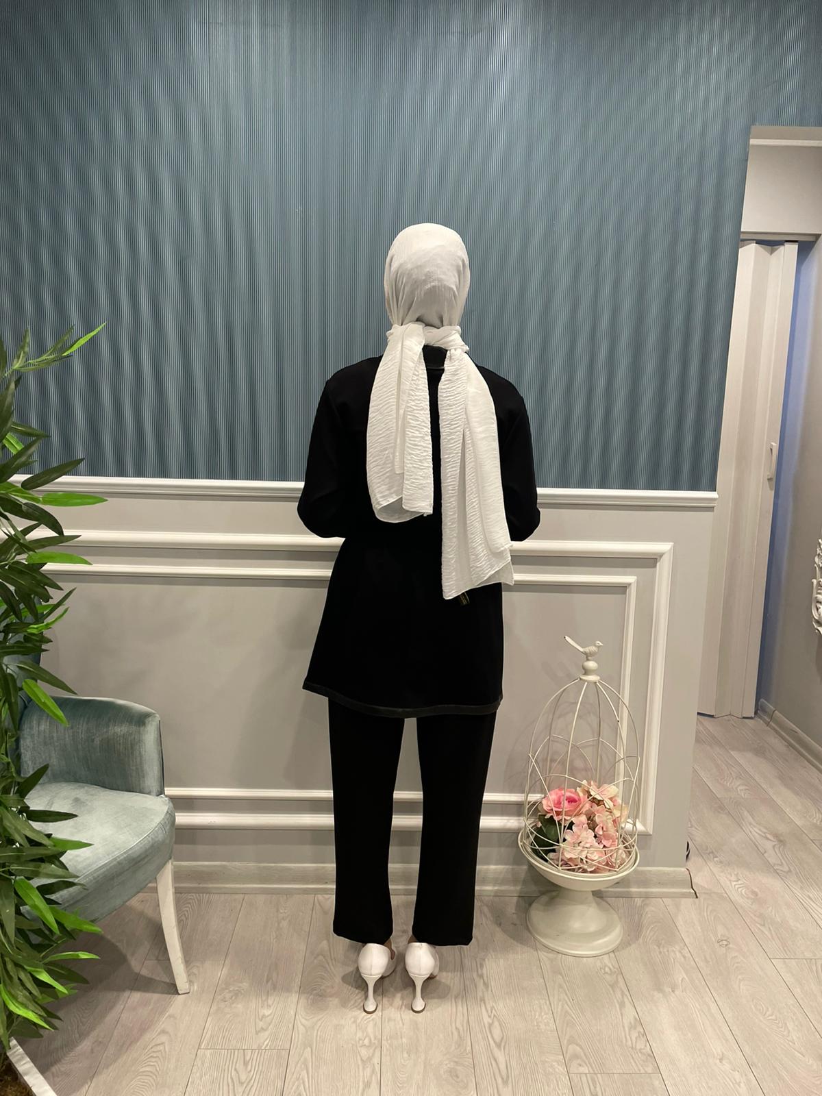 DERİ DETAYLI ÖRME CEKET
